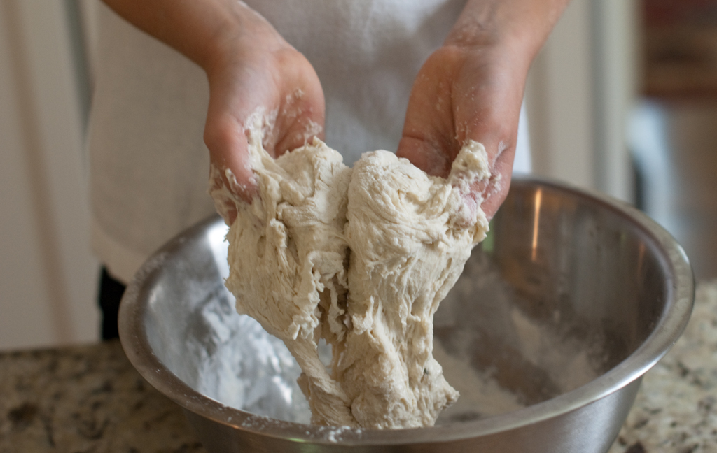 https://www.backtoorganic.com/wp-content/uploads/2012/05/pita-bread-kneading.jpg