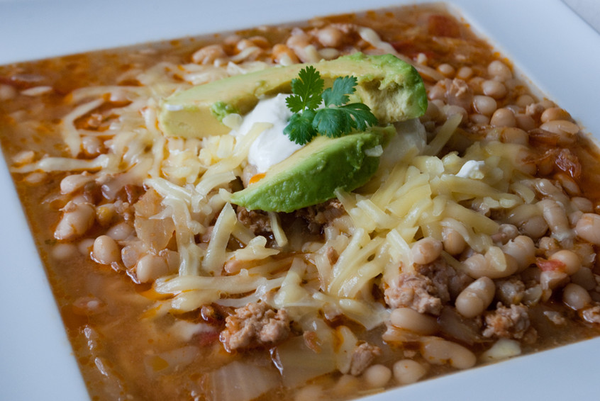 italian-sausage-and-bean-chili-with-cheese-and-avocado