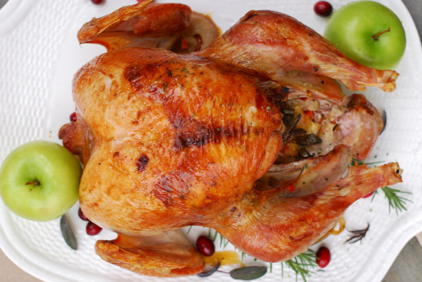 roasted-turkey-with-cranberries,-herbs-and-apples-as-garnish