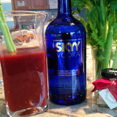 spicy-bloody-marys-in-a-pitcher-with-skyy-vodka,-celery-and-Margarita-Himalayan-Salt