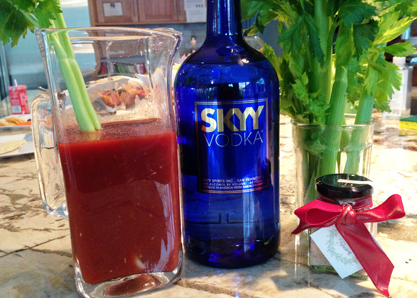 spicy-bloody-marys-in-a-pitcher-with-skyy-vodka,-celery-and-Margarita-Himalayan-Salt