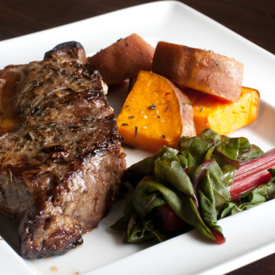 rosemary-grass-fed-new-york-strip-steak-with-sweet-potatoes-and-swiss-chard