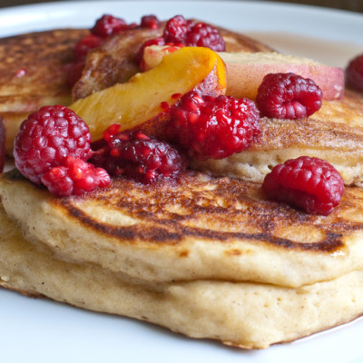 peach-pancakes-with-fresh-raspberries-and-peaches-plated