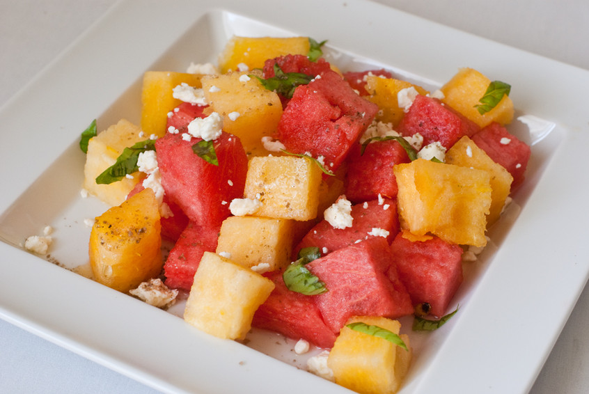 red-and-yellow-watermelon-with-fresh-basil,-feta-and-Smoked-applewood-pacific-sea-salt