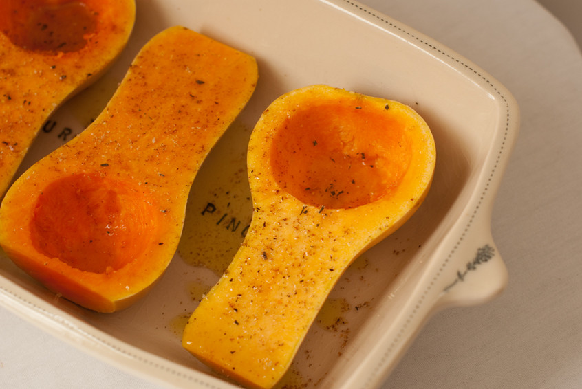 butternut-squash-cut-lengthwise-and-seasoned