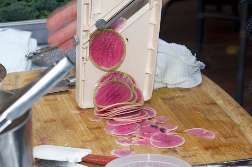 slicing-watermelon-radishes-on-a-mandolin