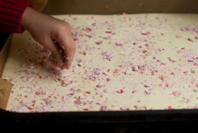 sprinkling-the-peppermint-pieces-over-the-chocolate