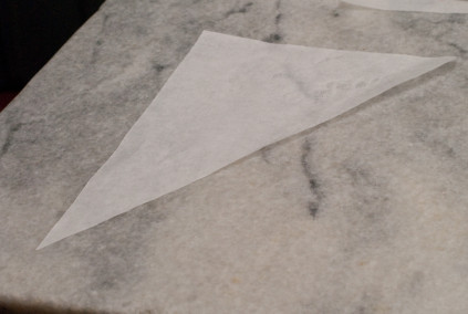 parchment-paper-cut-into-a-triangle