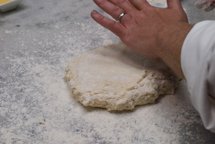 patting-the-potato-donut-dough