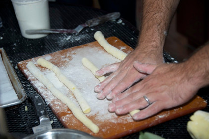 rolling-out-the-gnocchi-dough-to-cut-into-pieces