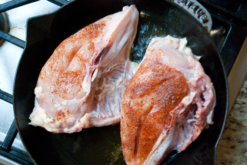 searing-chicken-skin-side-down-before-baking